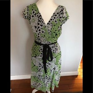 Green and black floral dress.